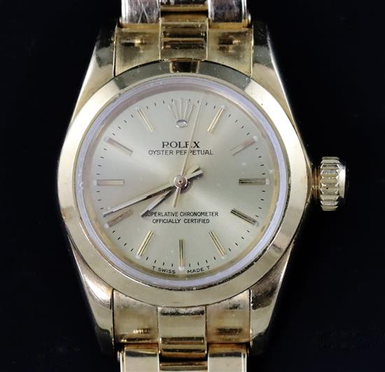 A ladys 1990s 18ct gold Rolex Oyster Perpetual wrist watch, on 18k gold Rolex bracelet,